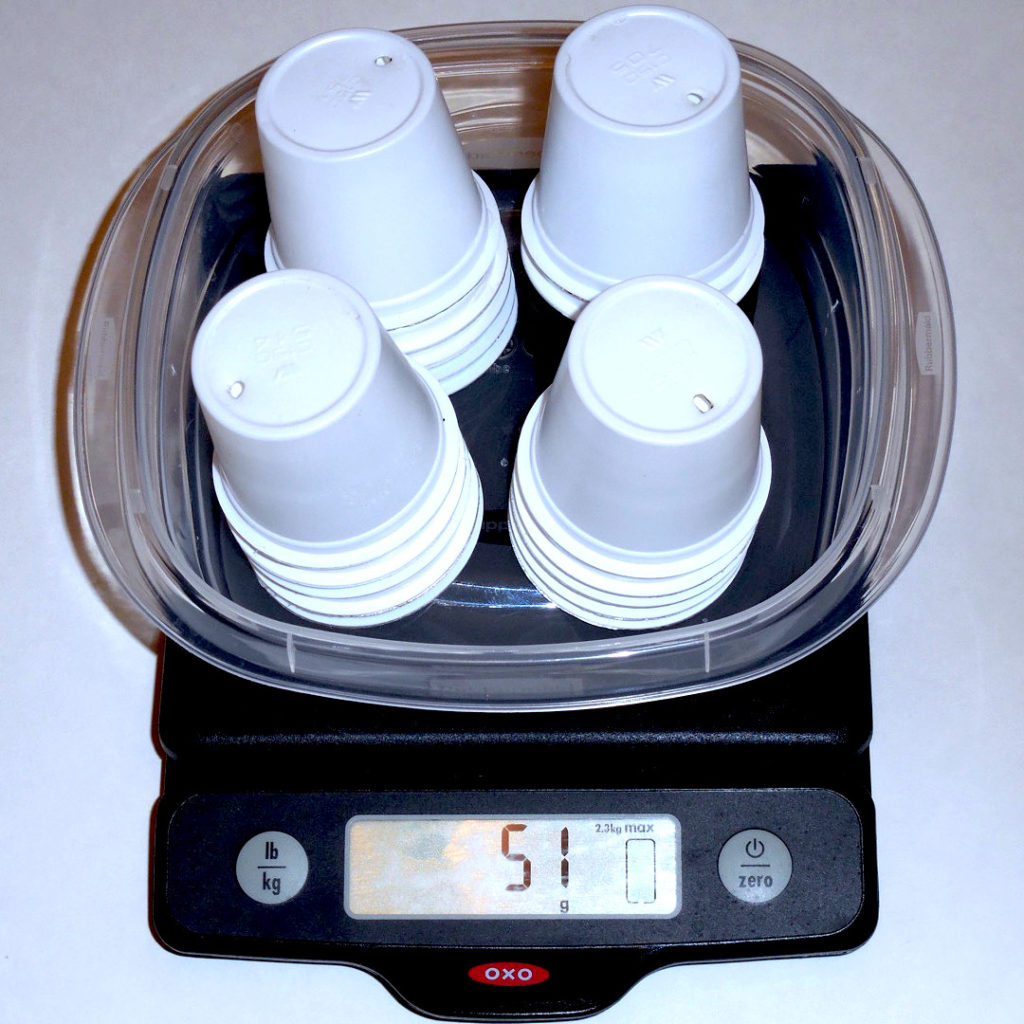 20 k-cups on a scale showing a weight of 51 grams